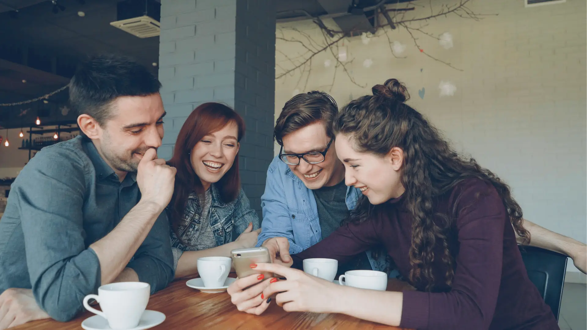 Social media team reviewing mistake 4: weak calls to action and poor sales copy in a collaborative workspace