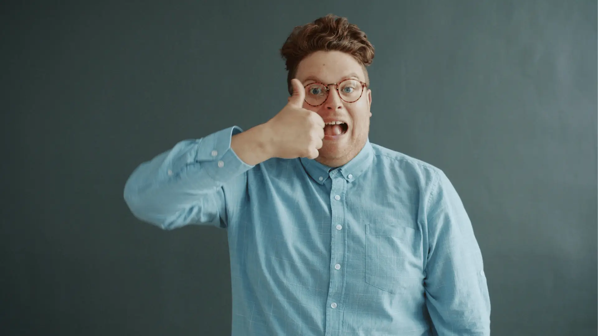 Social media team reviewing mistake 7: undercharging because of fear and comparison in a collaborative workspace