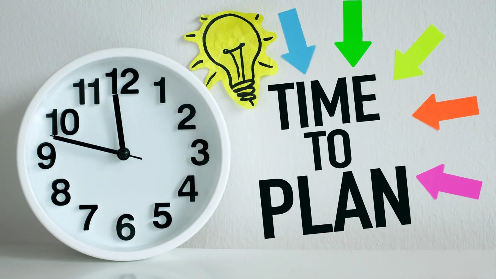White analog clock beside bold 'TIME TO PLAN' text and colorful arrows for AI-assisted workflow