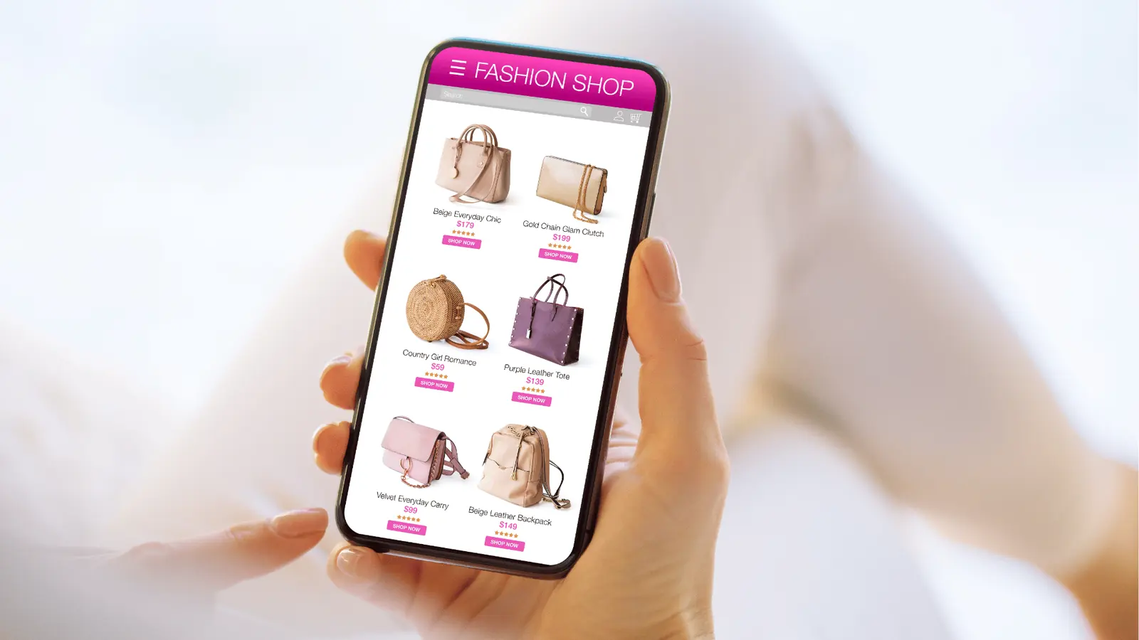 Hands holding smartphone showing an online fashion shop listing handbags for campaign planning