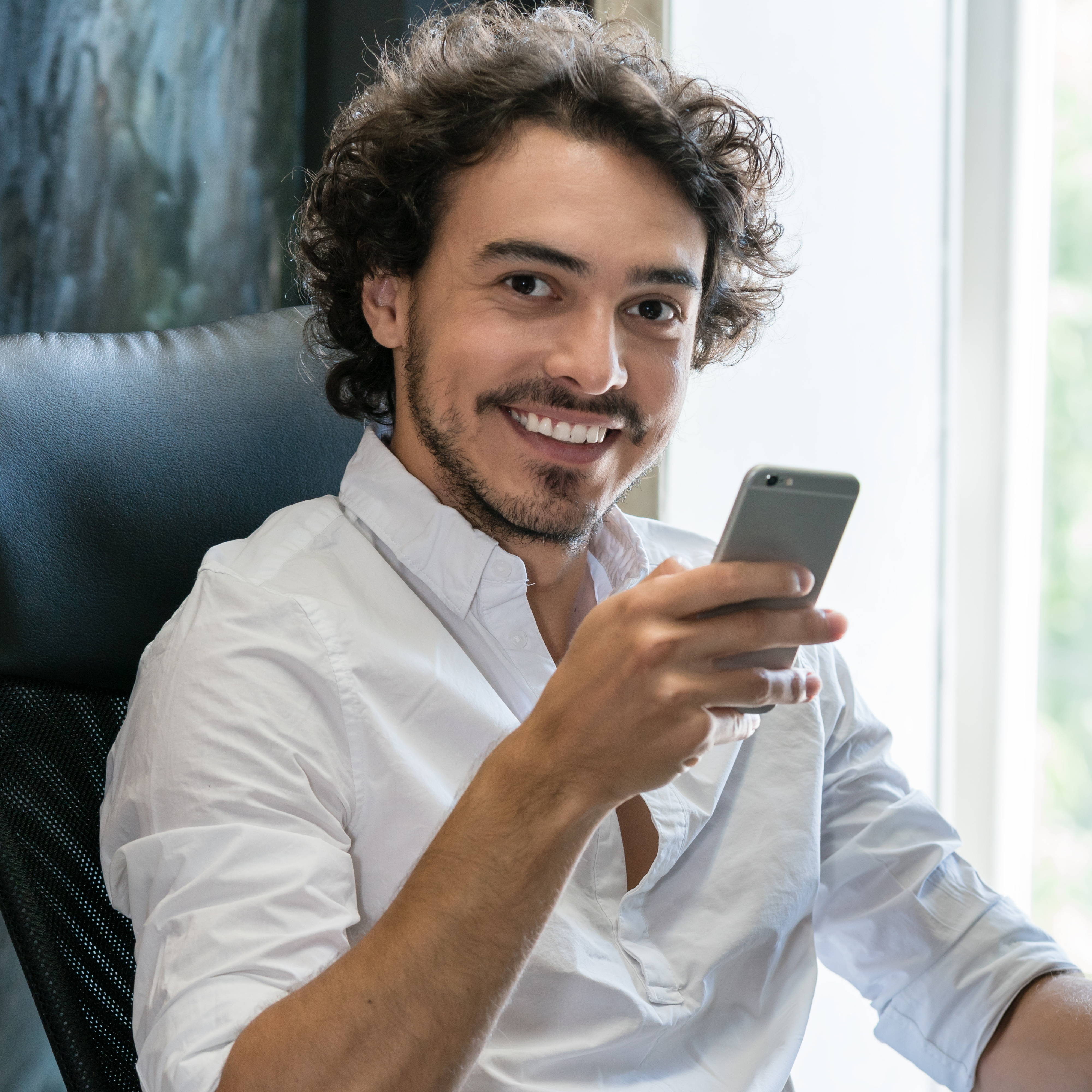 Creator recording a short-form social video with a smartphone